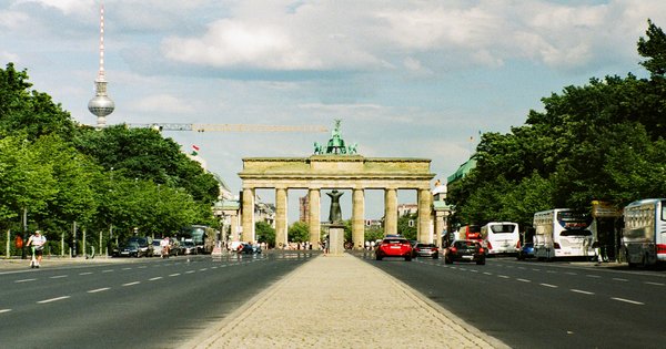 The Brandenburg Gate in Berlin with the TV tower in the background