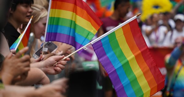 Rainbow flags and crowds in central Brussels during a previous Pride parade